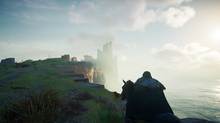 Assassin's Creed Valhalla: Eivor on horseback overlooking a castle