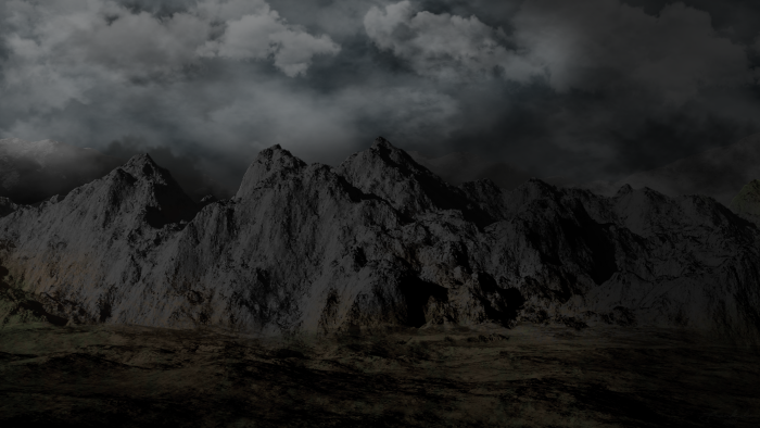 Dark, stormy sky over jagged mountains