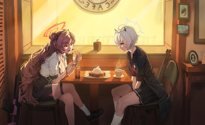 Two girls at a cafe with a gun and a guitar