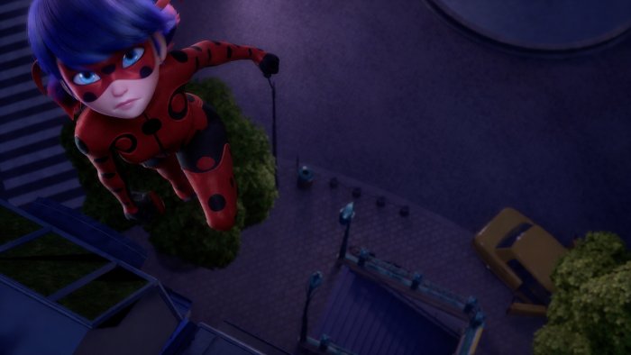 Ladybug flying over a city at night