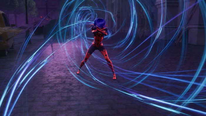 Miraculous Ladybug character with blue energy swirls
