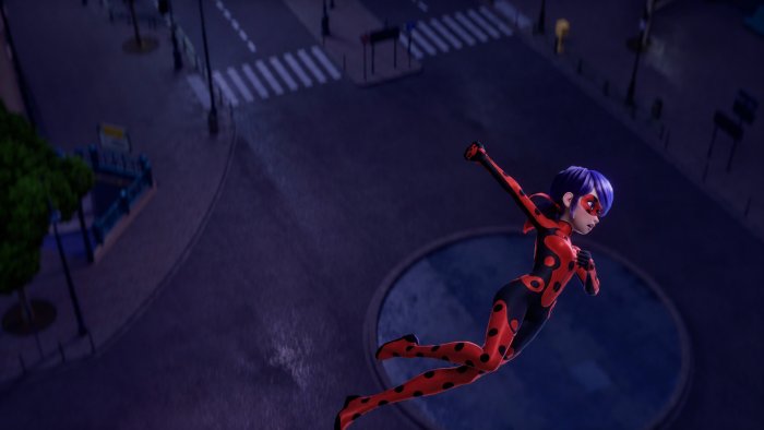 Ladybug flying over a city at night