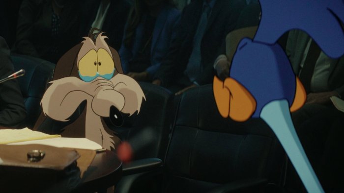 Wile E. Coyote crying next to Road Runner