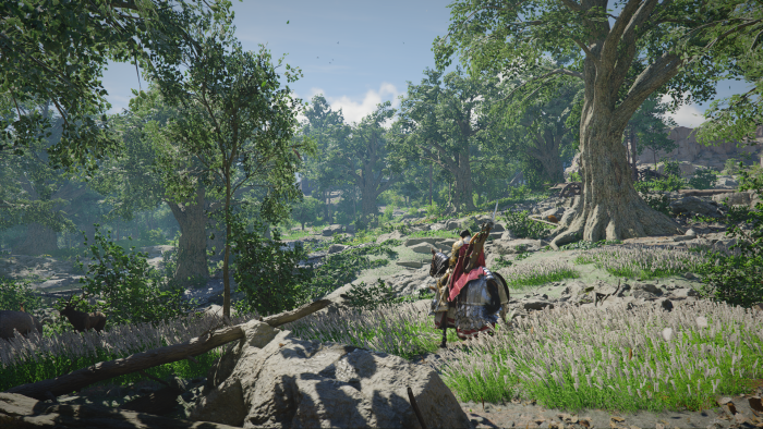 Assassin's Creed Valhalla character on horseback in a forest