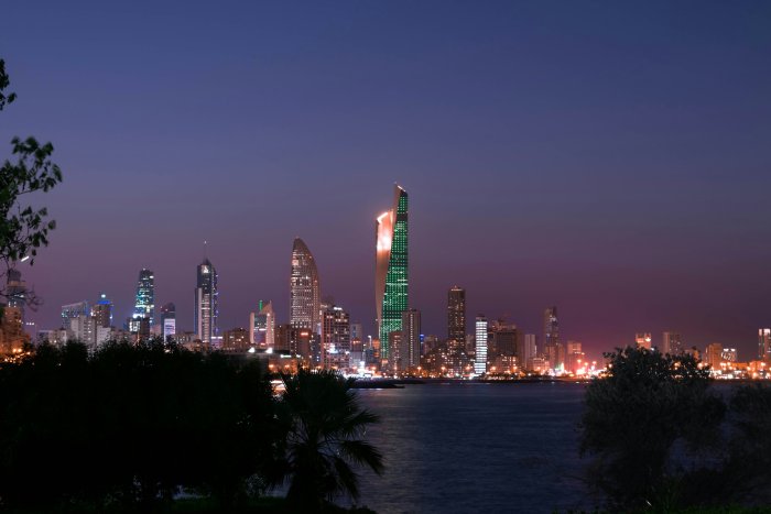 City Skyline at Night Over Water