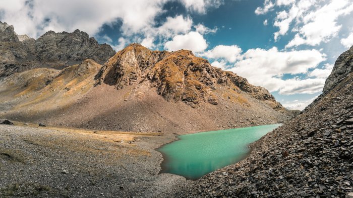 Turquoise lake nestled in a rocky mountain landscape