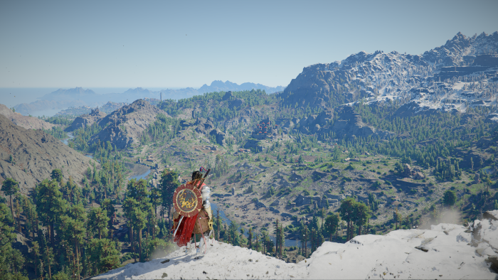 Assassin's Creed Valhalla character overlooking a mountain landscape