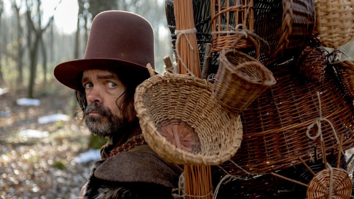 Man in a hat with baskets