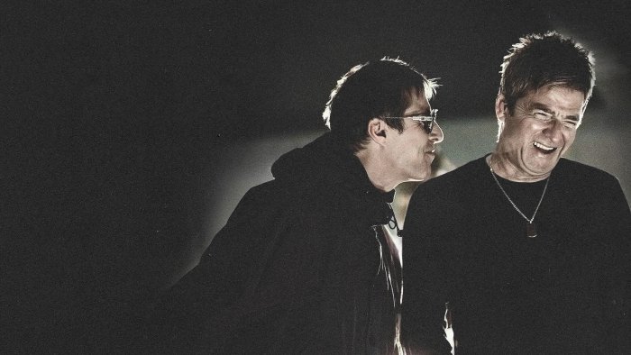 Liam and Noel Gallagher laughing