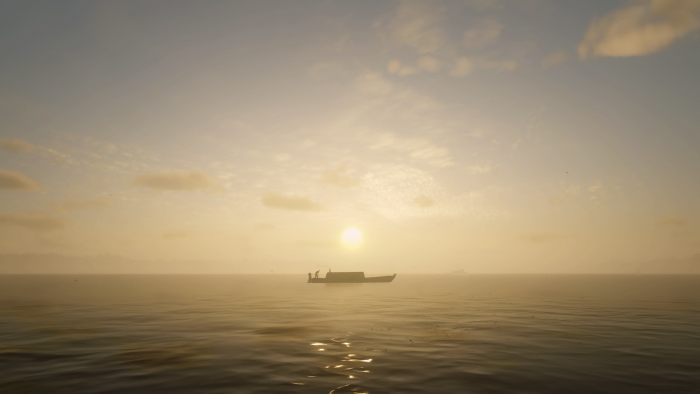 Boat on the water at sunrise