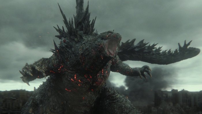Godzilla roaring in a destroyed city