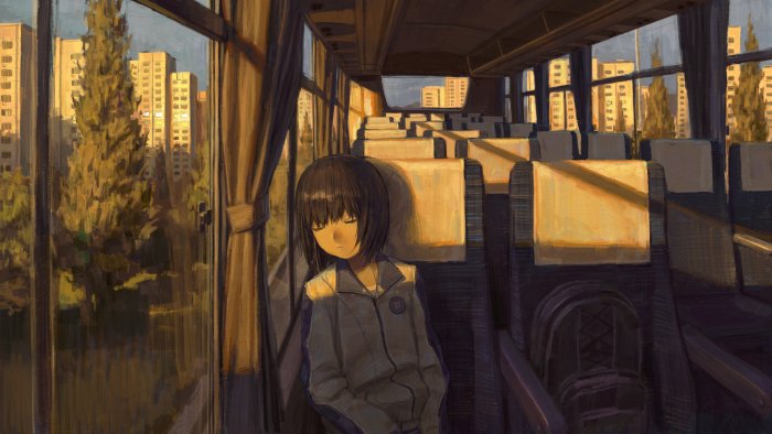 Girl sleeping on a bus during sunset