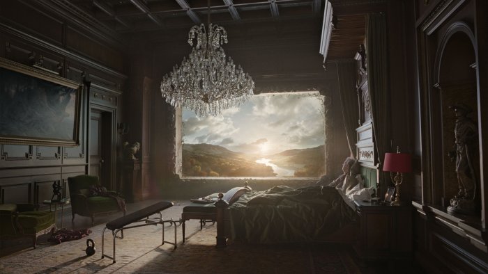 Man in Bed Overlooking a River Valley