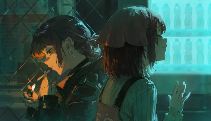 Two girls by a vending machine at night