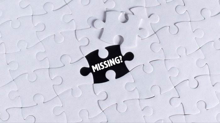 Puzzle piece with "MISSING?" text