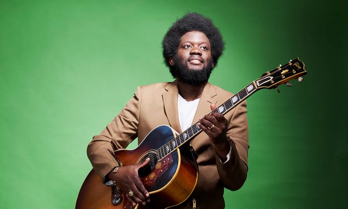 Michael Kiwanuka with guitar