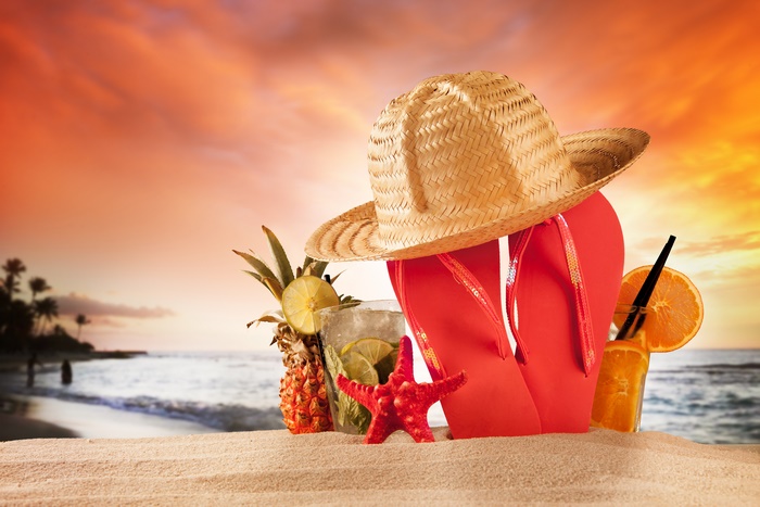 Summer Beach Scene with Drinks and Hat