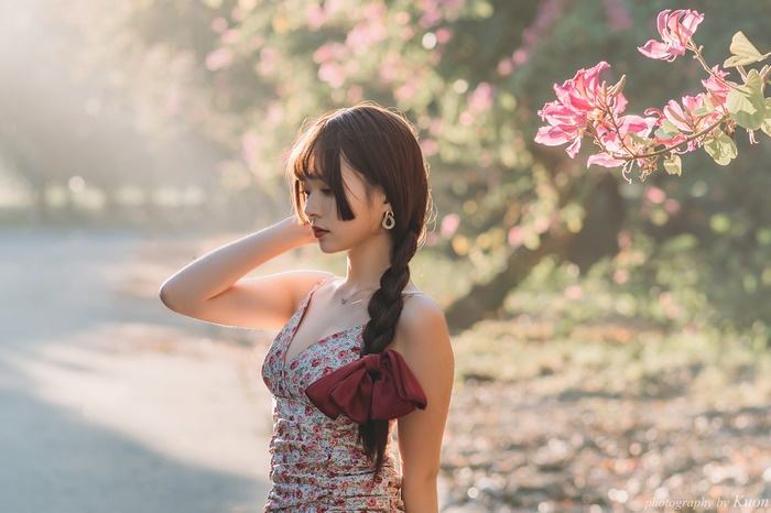 Asian Woman with Braid in Soft Light 4K