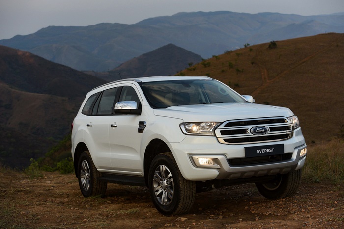White Ford Everest SUV on a mountain road