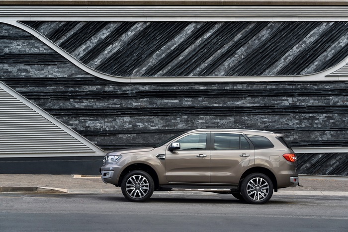 Ford Everest SUV parked by a modern building