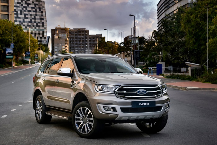 Silver Ford Everest SUV on a City Street