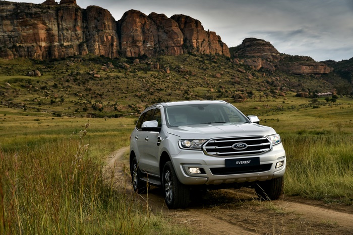 Silver Ford Everest SUV in a rocky landscape