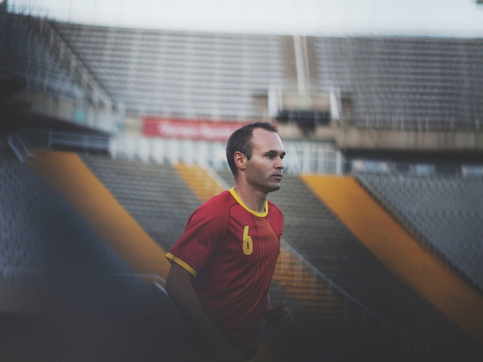 Andrés Iniesta in soccer uniform with number 6