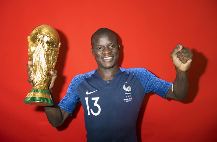 N'Golo Kante holding the World Cup trophy