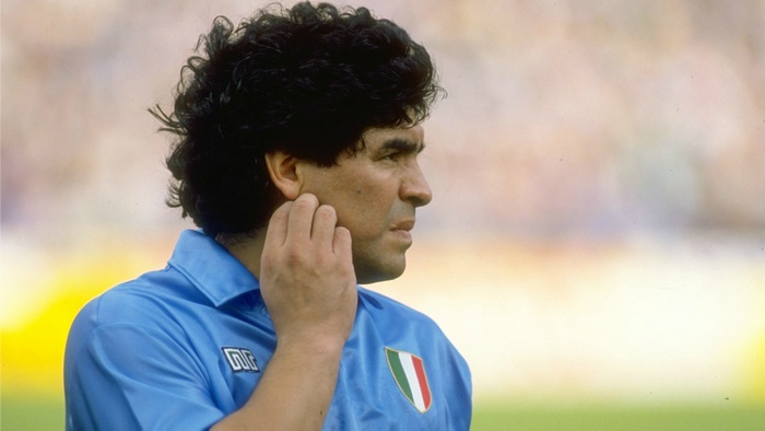 Diego Maradona in a blue Napoli jersey