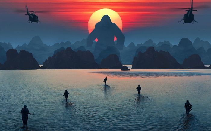 King Kong with soldiers and helicopters at sunset