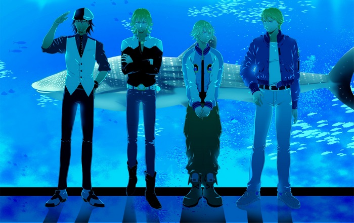 Four men in front of a whale shark at an aquarium