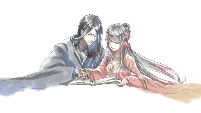 Couple reading a book together
