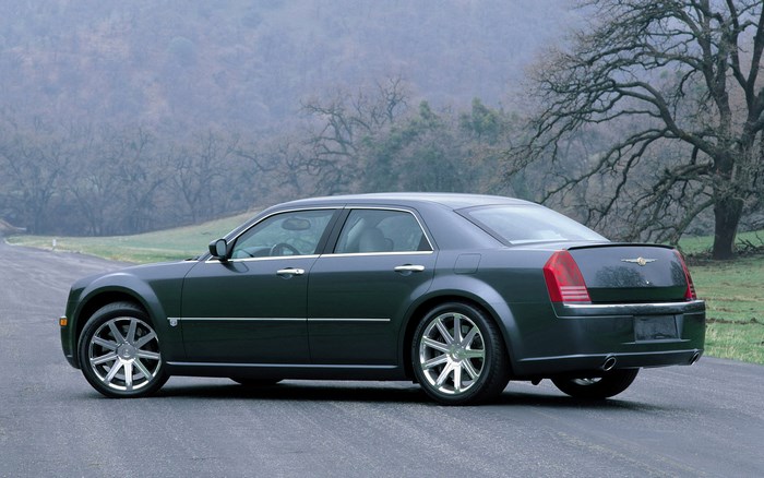 Dark gray Chrysler 300C sedan parked on a road