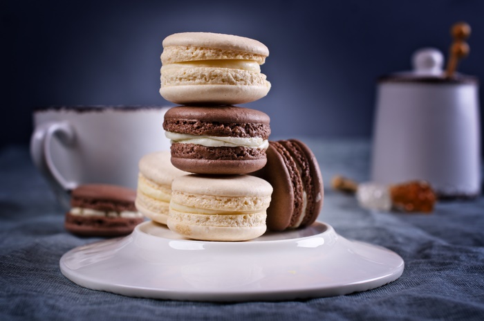 Stack of Macarons with Coffee Cup and Sugar Cubes