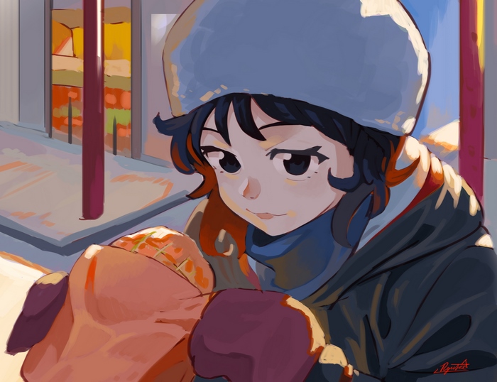 Girl in winter clothes holding something