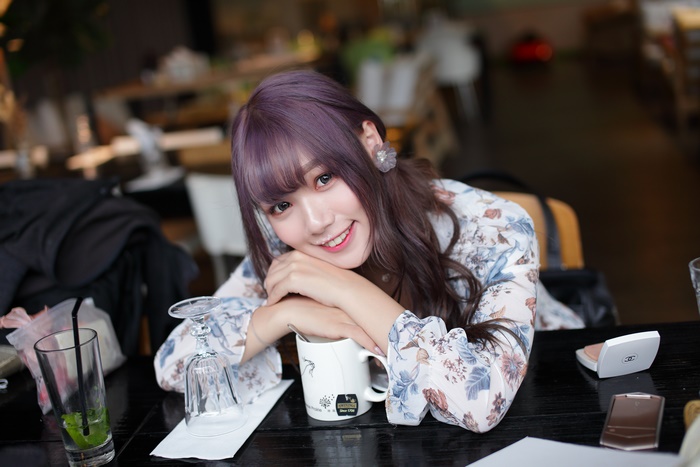 Asian Model Smiling with Purple Hair