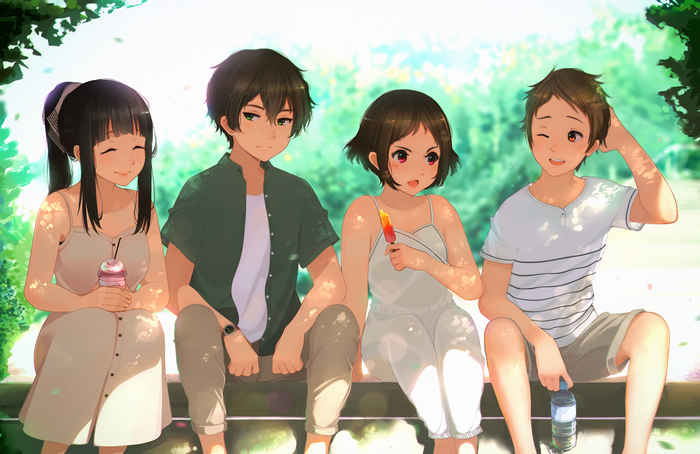 Four friends enjoying ice cream and drinks in a park
