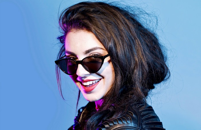 Charli XCX wearing sunglasses