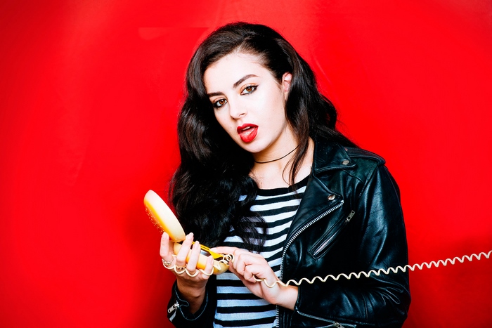 Charli XCX with a retro phone