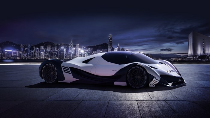 Devel Sixteen Prototype car in a city at night