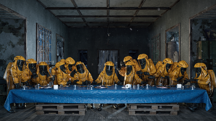 People in Hazmat Suits at a Last Supper Table