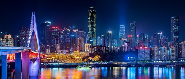 Chongqing cityscape with illuminated bridge at night
