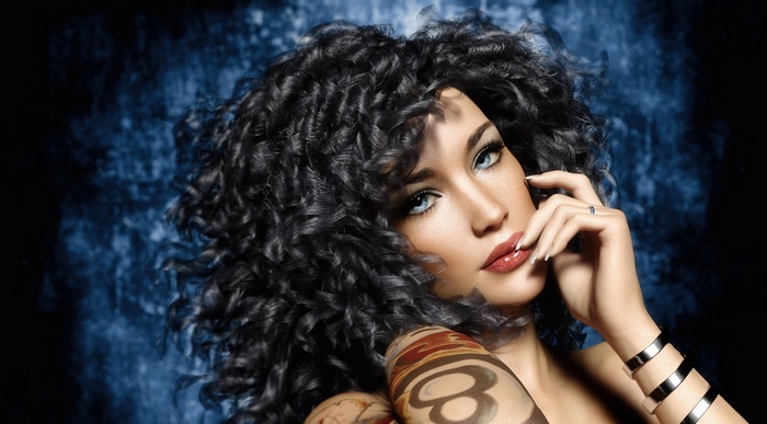 Artistic Portrait of Woman with Curly Hair