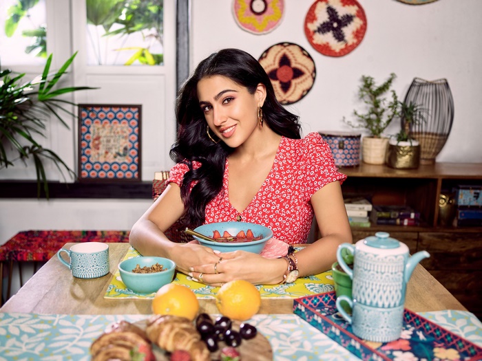 Sara Ali Khan eating breakfast at a table