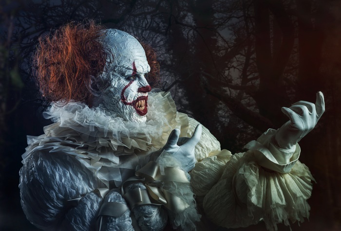 Creepy Clown with Red Hair and White Ruffled Costume