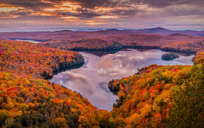 Autumn forest lake at sunset