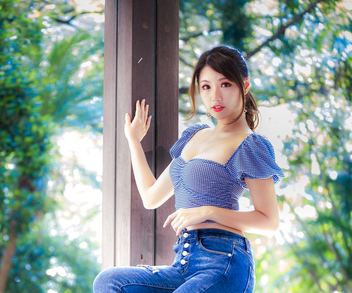 Asian Model Wearing Blue Outfit Outdoors
