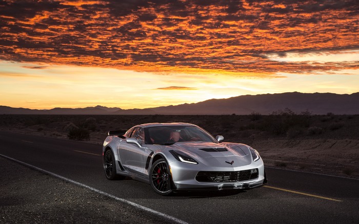 Silver 2015 Chevrolet Corvette Z06 on a Desert Road at Sunset