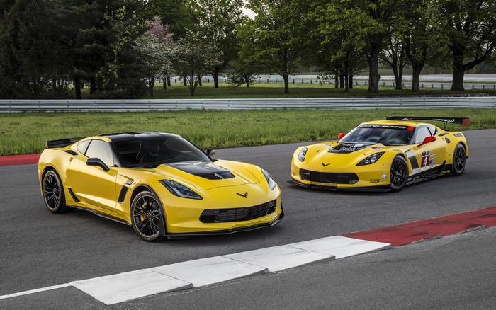 Two yellow Chevrolet Corvette Z06 C7.R Edition cars on a race track