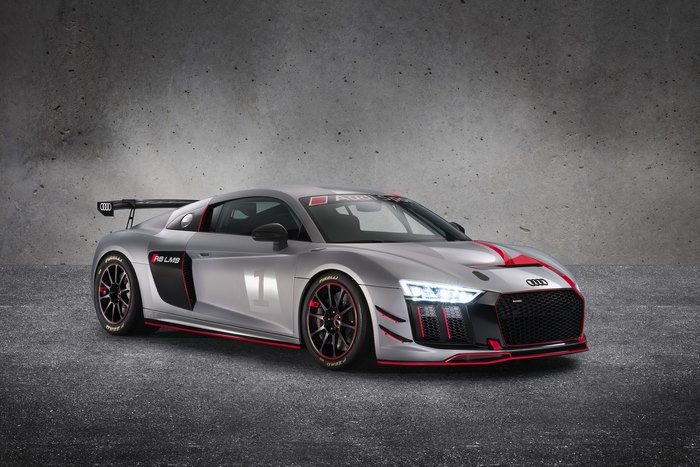 Silver Audi R8 LMS GT4 race car with red accents